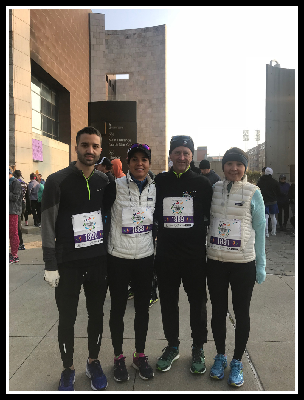 group of four people in race